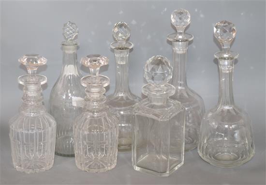 A collection of seven cut glass decanters